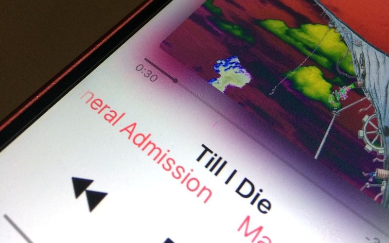 Apple Music playing a song called "Till I Die"